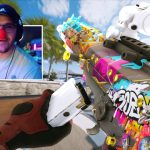 Colorful rifle and person with red nose playing game