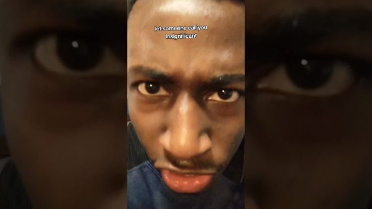 Man's face with intense expression and text overlay.