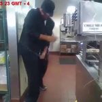 Person working in commercial kitchen spills liquid