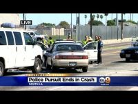 Police pursuit ends in South LA crash scene.