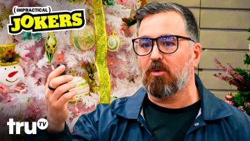 Man speaking near decorated Christmas tree