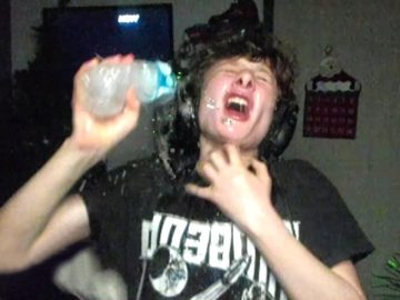Person splashing water on face joyfully