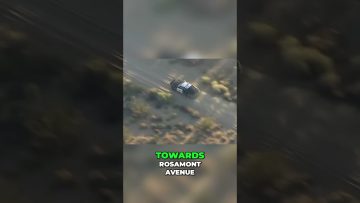 Police car driving off-road towards Rosamont Avenue.