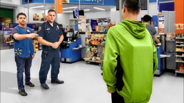 Store employee and officer confront customer in green hoodie.