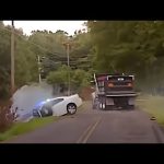 Car and truck accident on rural road.