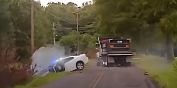 Car and truck accident on rural road.