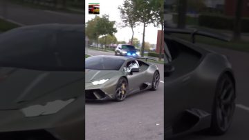 Green sports car followed by police vehicle.