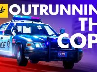 Police car in pursuit with flashing lights