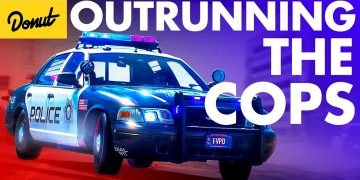 Police car in pursuit with flashing lights