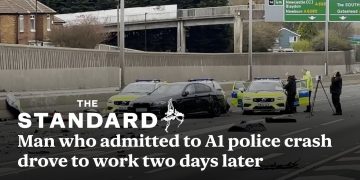 Police at A1 highway crash scene with vehicles