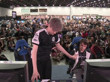 Esports event with gamers and audience.