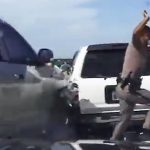 Highway collision involving police officer and vehicles.