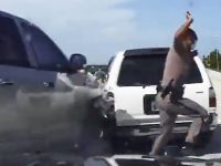 Highway collision involving police officer and vehicles.