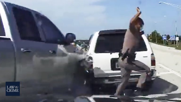 Highway collision involving police officer and vehicles.