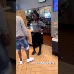 Fast food restaurant staff argues with customer.