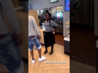 Fast food restaurant staff argues with customer.
