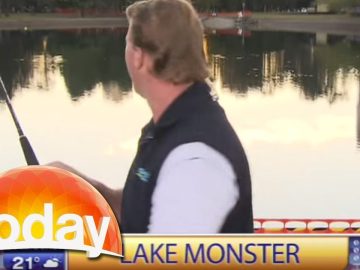 Reporter fishing in lake during news segment.