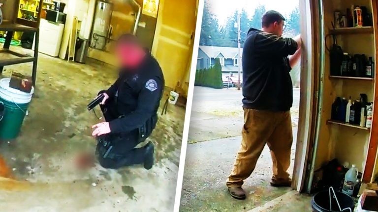 Police officer kneeling with gun inside garage.