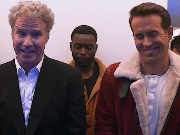 People smiling inside an elevator