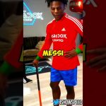 Person in red soccer jersey with 'Messi' text.