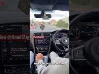 Driving Volkswagen car on city road, unexpected overtake.