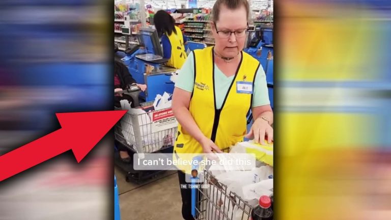 Store employee at checkout counter with cart.