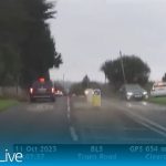 Cars on Truro Road in rainy weather conditions.