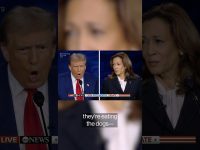 Presidential debate with two candidates speaking.