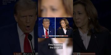 Presidential debate with two candidates speaking.