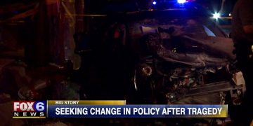 Damaged car after tragic accident at night.