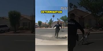 Police officer chasing running dog on street