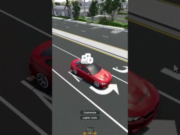 Red car in virtual driving game interface