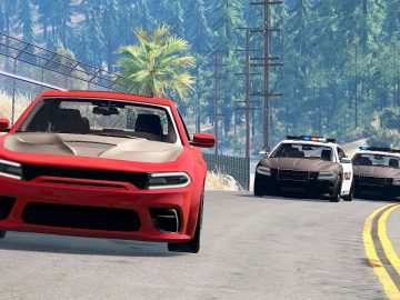 Red car chased by two police cars on road.