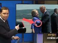 News presenter highlights handshake moment on screen.