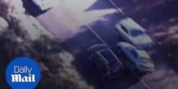 Three cars on highway, aerial view