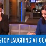 News anchors laughing during broadcast blooper.