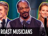 Three musicians smiling at comedy roast event.