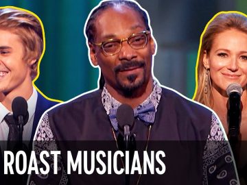 Three musicians smiling at comedy roast event.