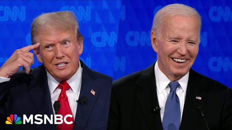 Two men in suits on TV debate screen.