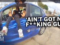 Police bodycam shows man in blue car shouting