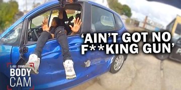 Police bodycam shows man in blue car shouting
