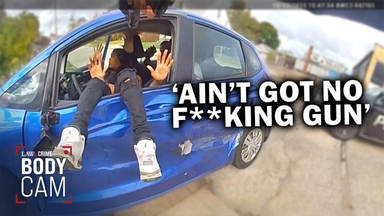 Police bodycam shows man in blue car shouting