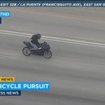 Motorcycle police chase on highway captured by news.