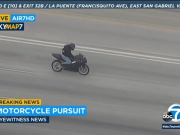 Motorcycle police chase on highway captured by news.