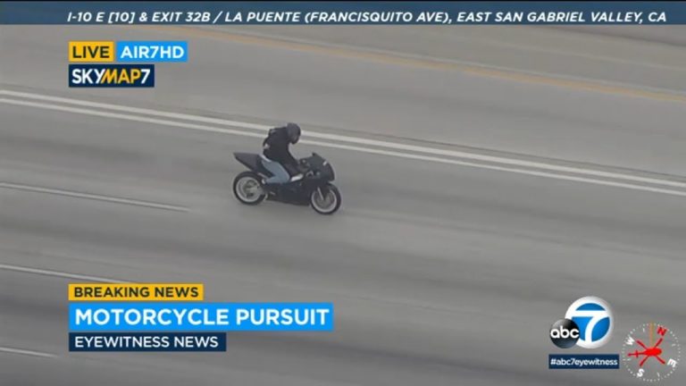 Motorcycle police chase on highway captured by news.