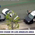 Police vehicle at car chase scene, Los Angeles