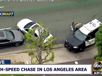 Police vehicle at car chase scene, Los Angeles