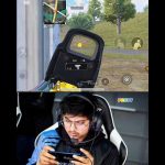 Person playing mobile shooting game with focus