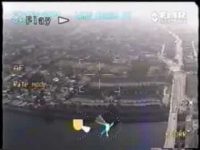 Aerial video footage of urban landscape with roads.