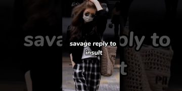 Stylish woman with mask and sunglasses walking confidently.